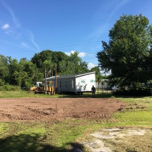Placing Mobile home on the leveled ground.